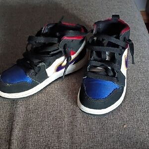Air Jordan 1 Mid SE Nike Black and Blue High Top Sneakers